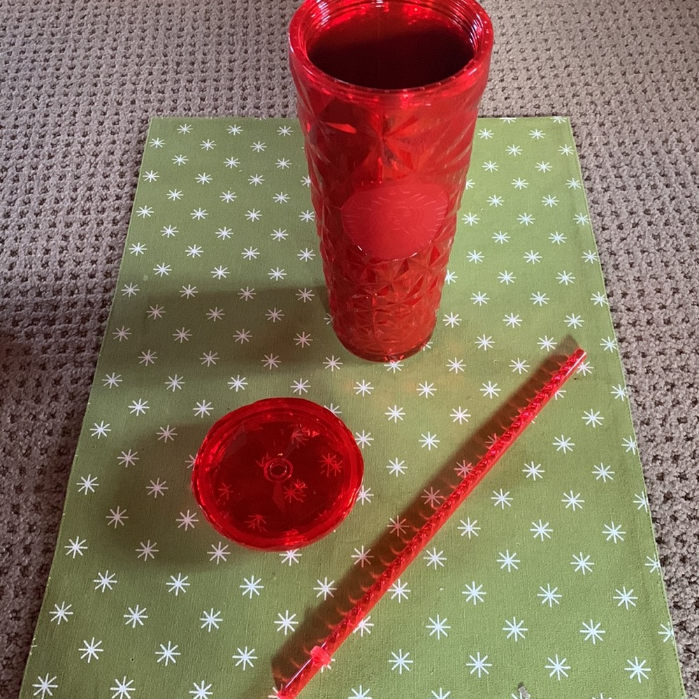 Starbucks cup with straw and lid